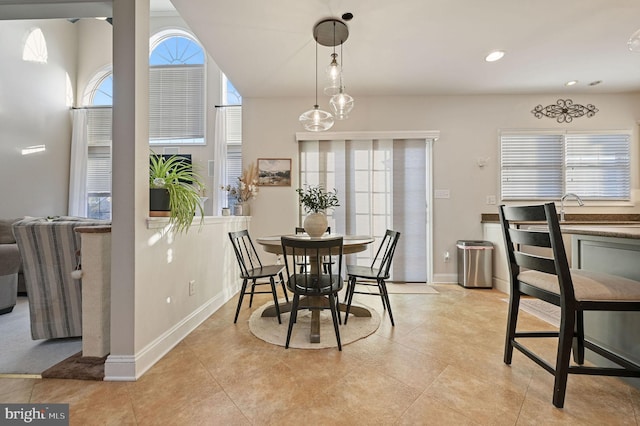 dining space with light tile patterned flooring