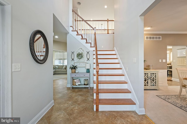 stairs with crown molding