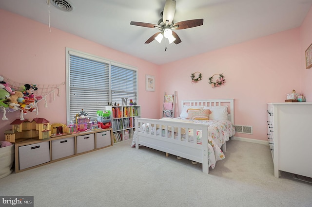 carpeted bedroom with ceiling fan