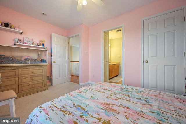 bedroom with ceiling fan and light colored carpet