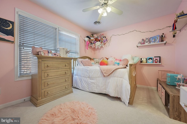 carpeted bedroom with ceiling fan