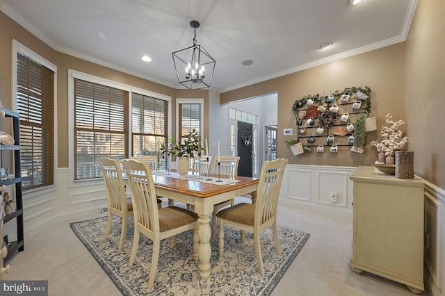 carpeted dining space featuring an inviting chandelier and crown molding