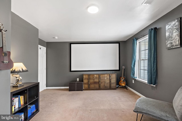 home theater featuring carpet, visible vents, and baseboards