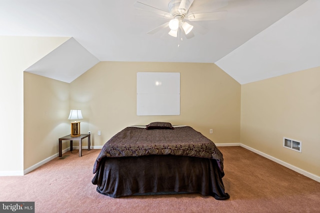 carpeted bedroom featuring lofted ceiling, ceiling fan, visible vents, and baseboards