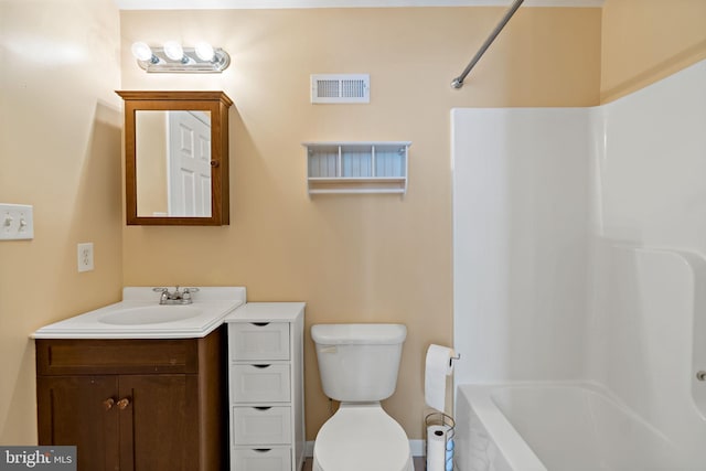 bathroom with toilet, tub / shower combination, vanity, and visible vents