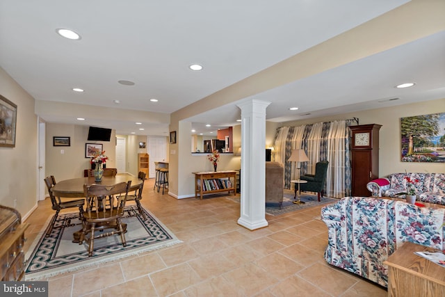 dining space featuring baseboards, light tile patterned flooring, decorative columns, and recessed lighting