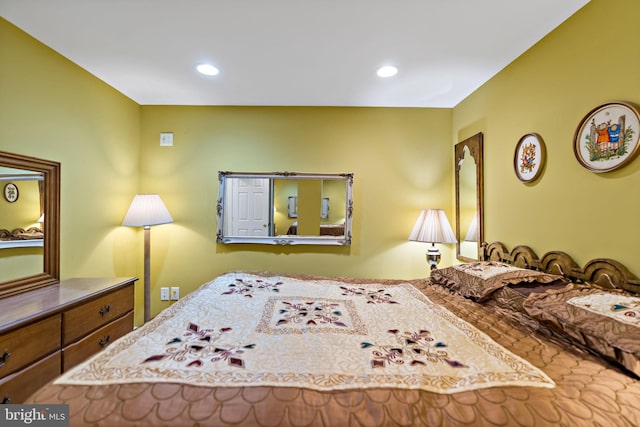 bedroom featuring recessed lighting