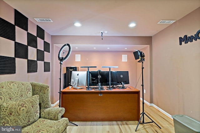 home office featuring recessed lighting, visible vents, baseboards, and wood finished floors