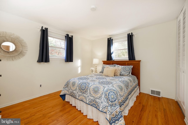 bedroom featuring hardwood / wood-style flooring