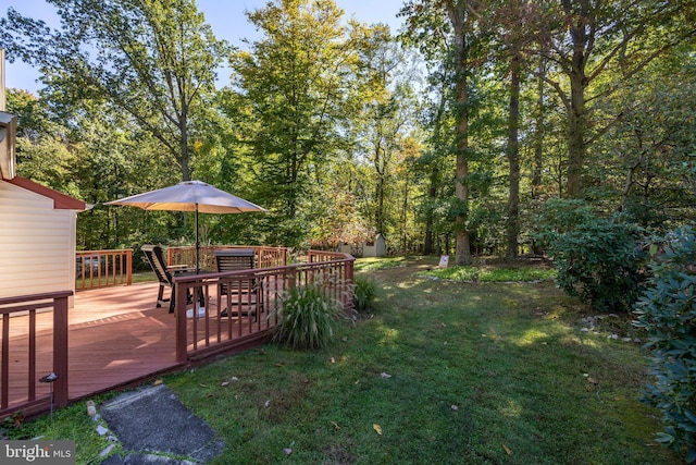 view of yard featuring a wooden deck