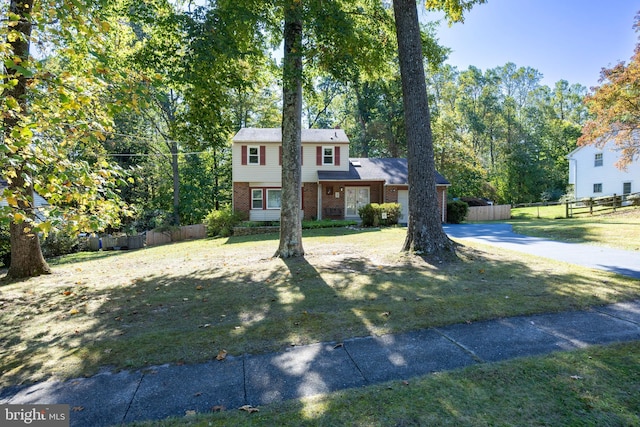 view of front of property with a front lawn