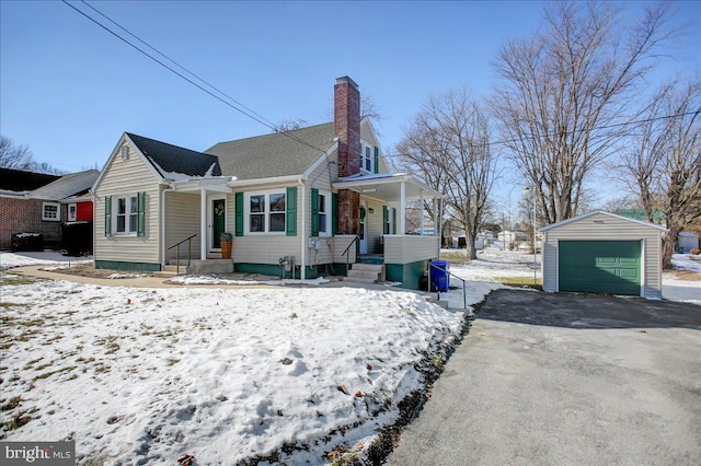 view of front of home with an outbuilding and a garage