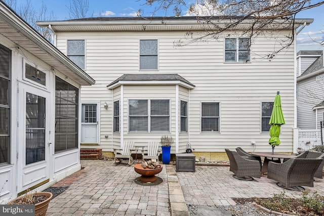 back of house featuring a patio