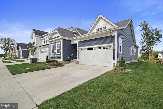 view of front facade featuring a front lawn and a garage