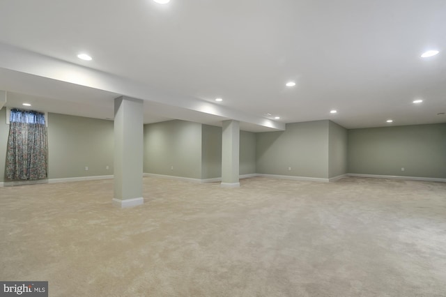 basement with light colored carpet