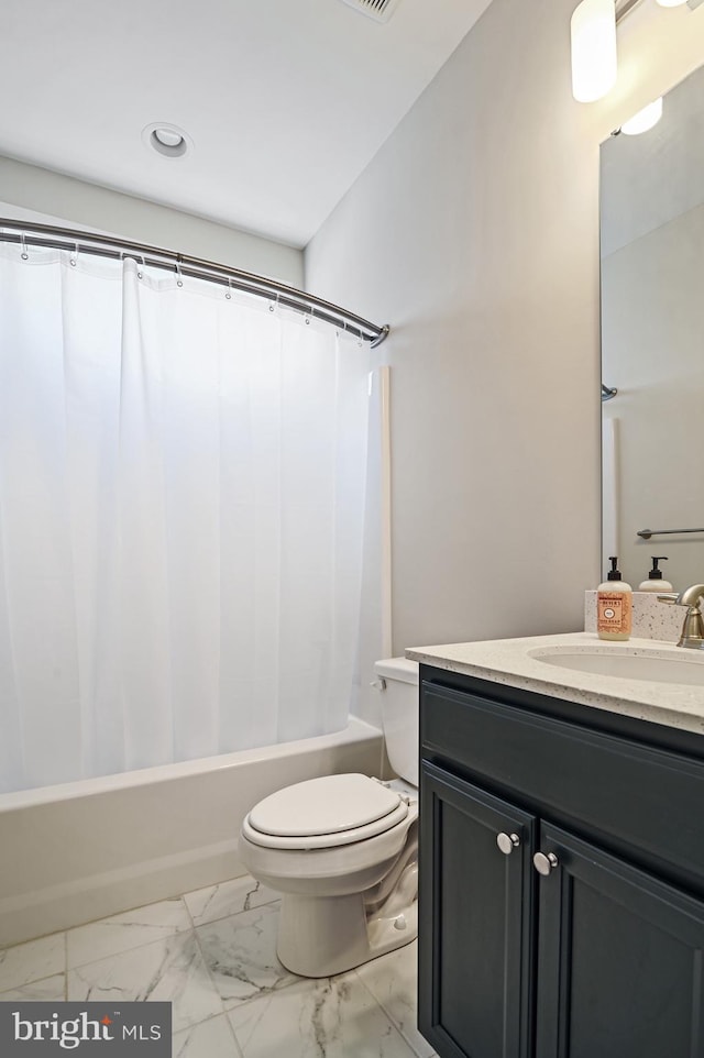 full bathroom with toilet, vanity, and shower / bath combo with shower curtain