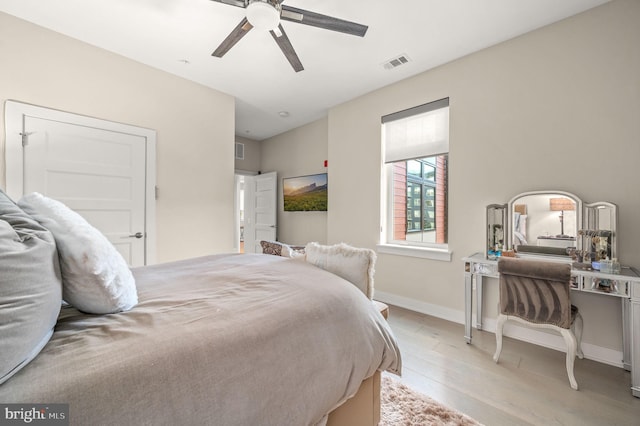 bedroom featuring ceiling fan and light hardwood / wood-style floors