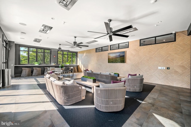 view of patio / terrace with ceiling fan and outdoor lounge area