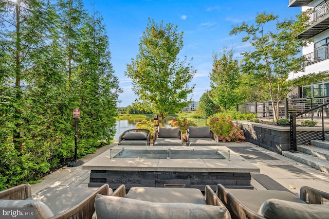 view of patio / terrace featuring a water view