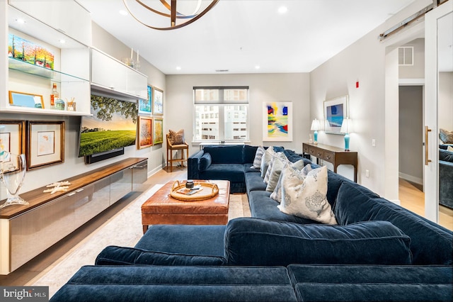 living room featuring a barn door