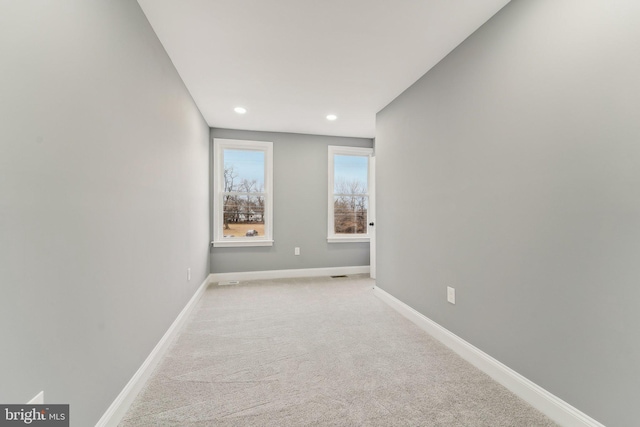 view of carpeted spare room