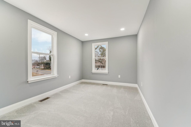 view of carpeted spare room