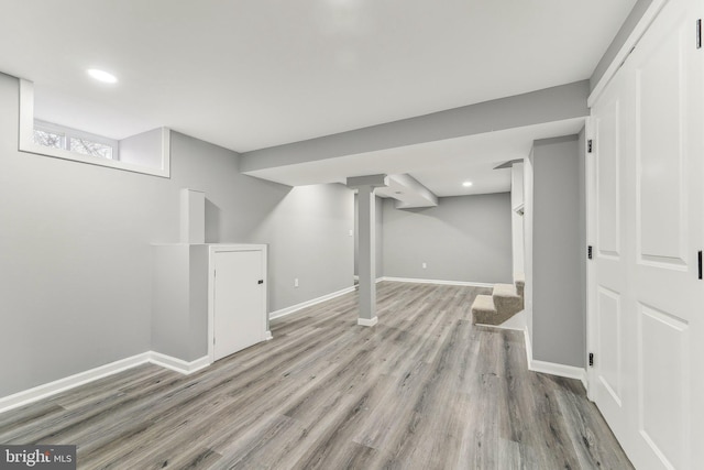 basement with light wood-type flooring