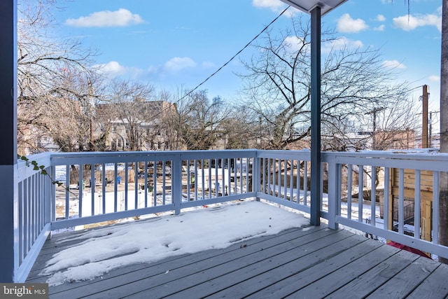 view of snow covered deck