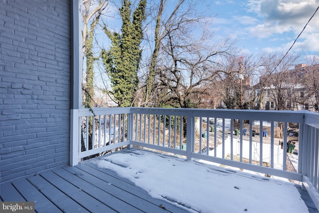 view of snow covered deck