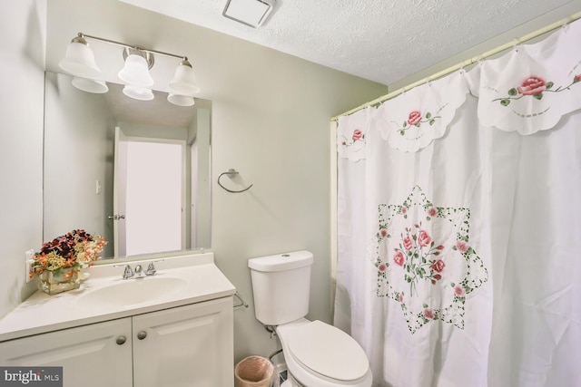 full bath featuring visible vents, toilet, a shower with curtain, a textured ceiling, and vanity