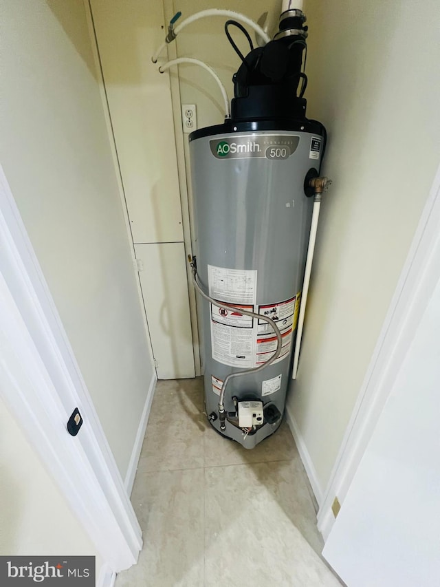 utility room with water heater