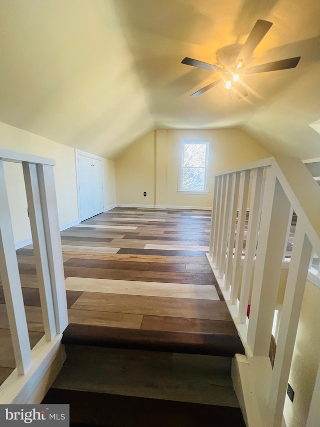 bonus room featuring hardwood / wood-style flooring, ceiling fan, and vaulted ceiling