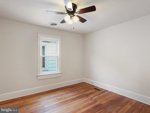 unfurnished room featuring light hardwood / wood-style floors and ceiling fan