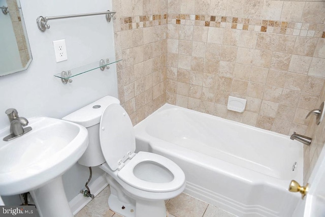 full bathroom with sink, tile patterned flooring,  shower combination, and toilet