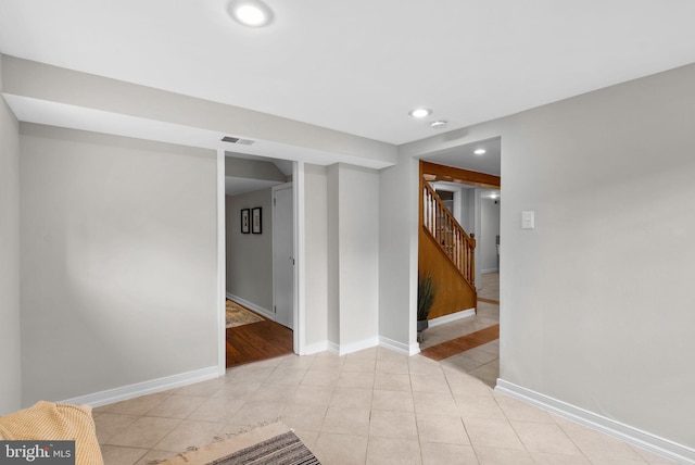 spare room with light tile patterned floors