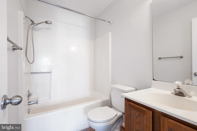 full bathroom featuring toilet, vanity, and  shower combination