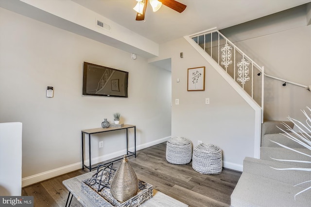 interior space featuring ceiling fan and wood-type flooring