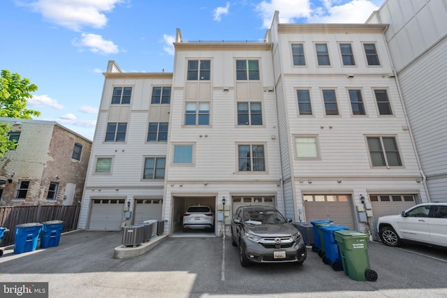 view of building exterior with central AC unit