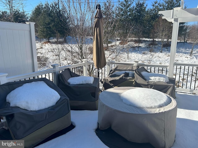 view of snow covered patio