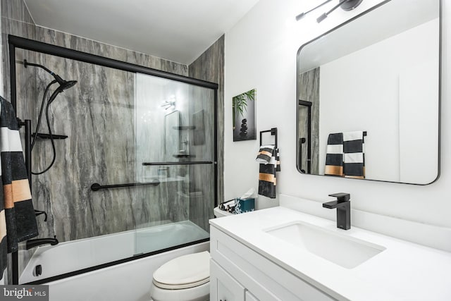 full bathroom featuring vanity, toilet, and enclosed tub / shower combo