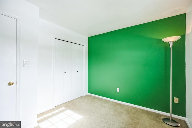 unfurnished bedroom featuring carpet