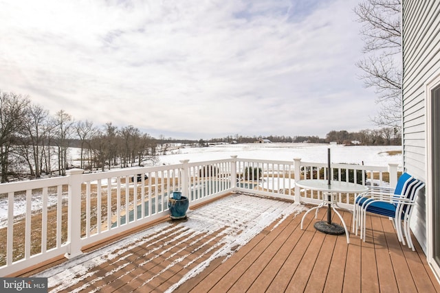 view of snow covered deck