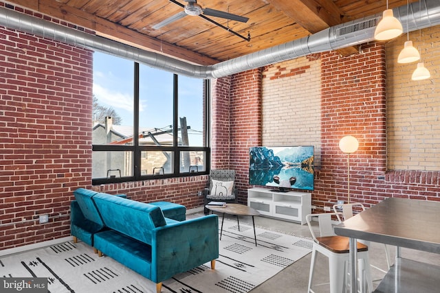 interior space featuring ceiling fan and wood ceiling