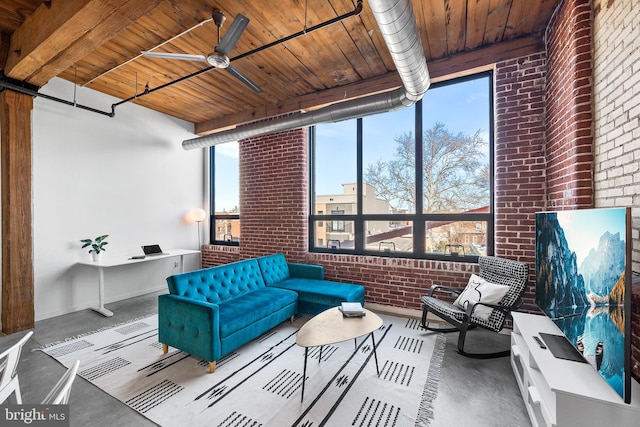 interior space featuring ceiling fan and outdoor lounge area