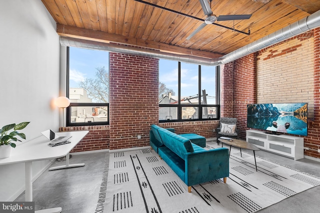 interior space with brick wall, ceiling fan, and wood ceiling