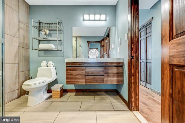 bathroom with toilet and vanity