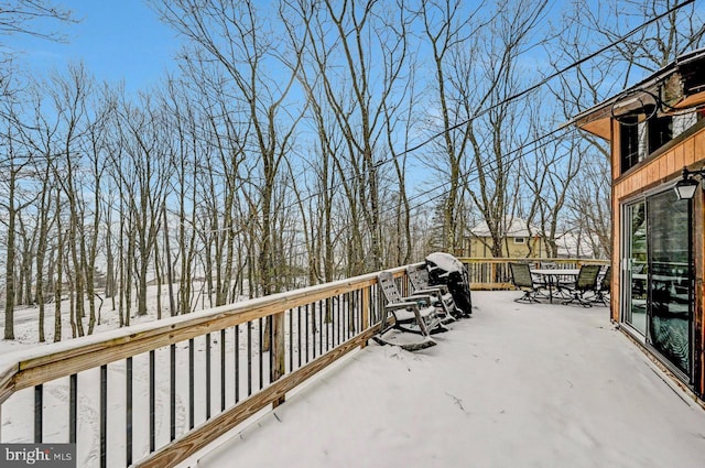 view of snow covered deck