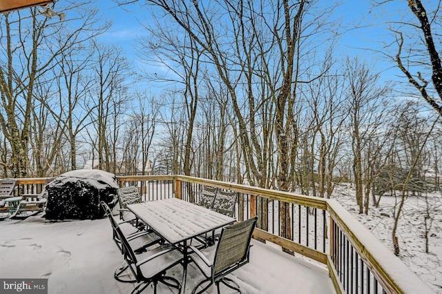 view of snow covered deck