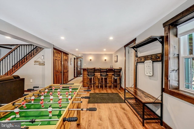 playroom featuring indoor bar and wood-type flooring