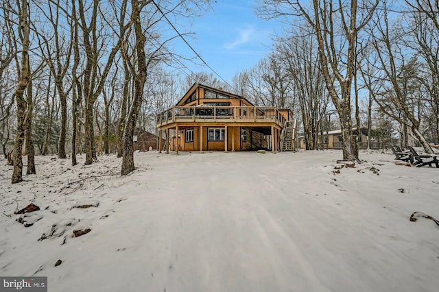 view of front of house with a wooden deck